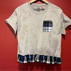 Cute Tee shirt enhanced with flannel ruffle on hem and flannel pocket.Vintage